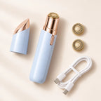 Depiladora facial azul con tapa, dos cabezales de recambio y cable USB-C