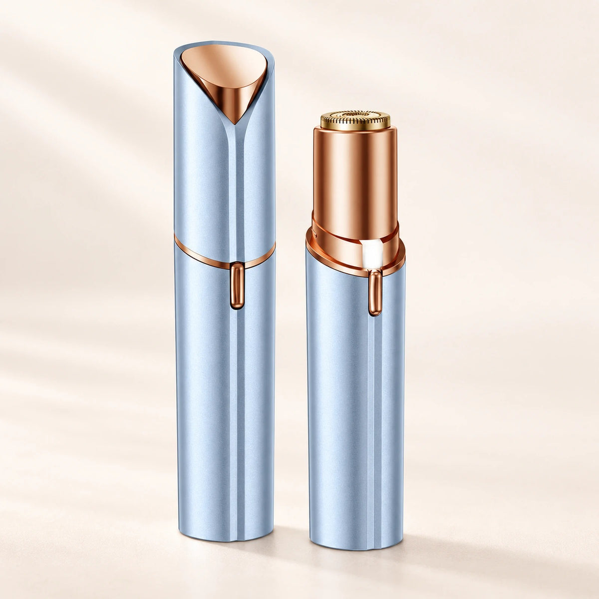 Depiladora facial azul y oro rosa, una cerrada y otra abierta