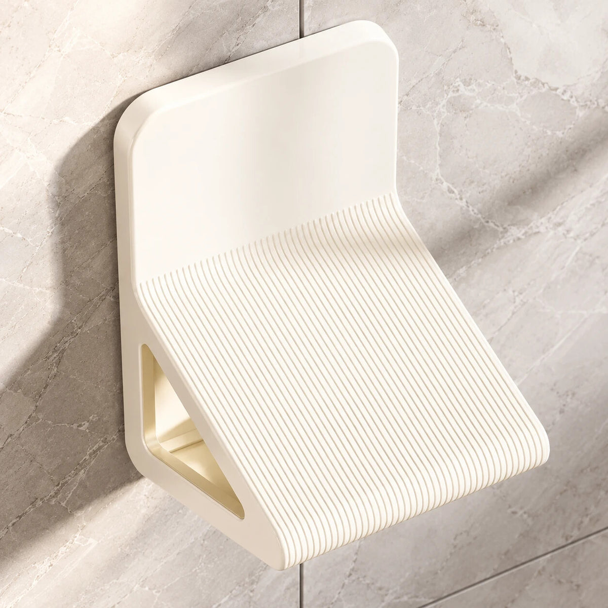 Reposapiés de ducha blanco pegado a la pared de azulejo